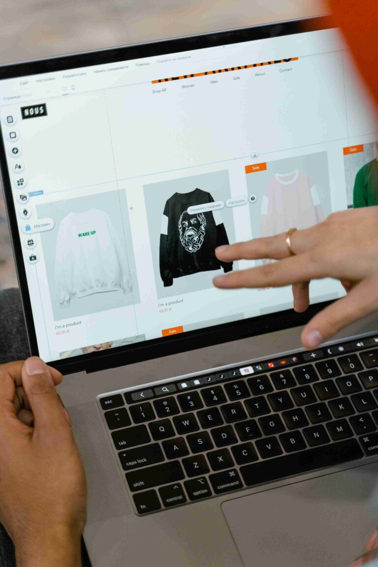 Online clothing store being reviewed on a laptop